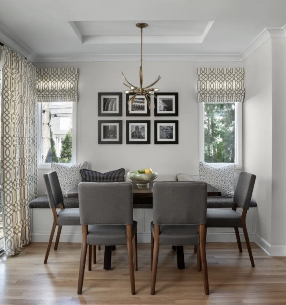 A roomy banquette in a kitchen nook with a doorwall creates a seating area that won’t block traffic flow. The cozy spot can easily accommodate Zoom calls and guests.

Beth Singer/Margeaux Interiors