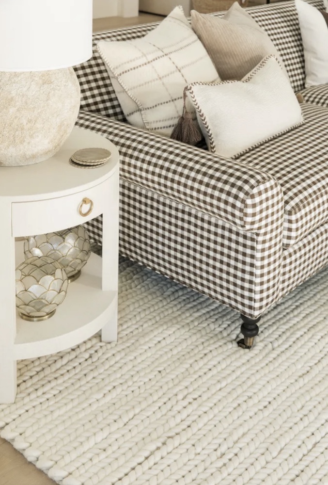 Upholstered pieces should be paired with end tables for convenience. Those with special features like extra shelves and drawers get bonus points.

Serena & Lily